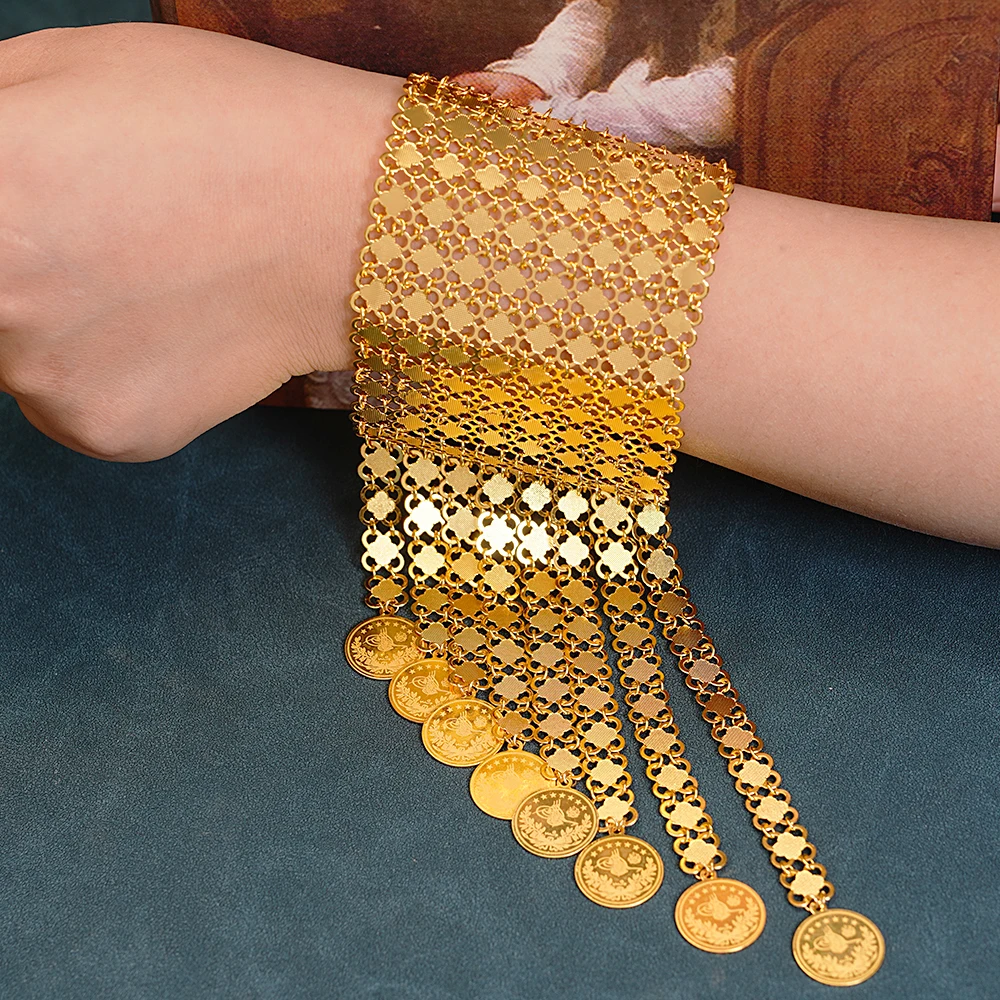 Ethnic Luxe Fashion - Bracelet plaqué or avec pompons pour